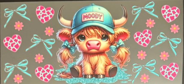 Vaca de las Highlands con margarita